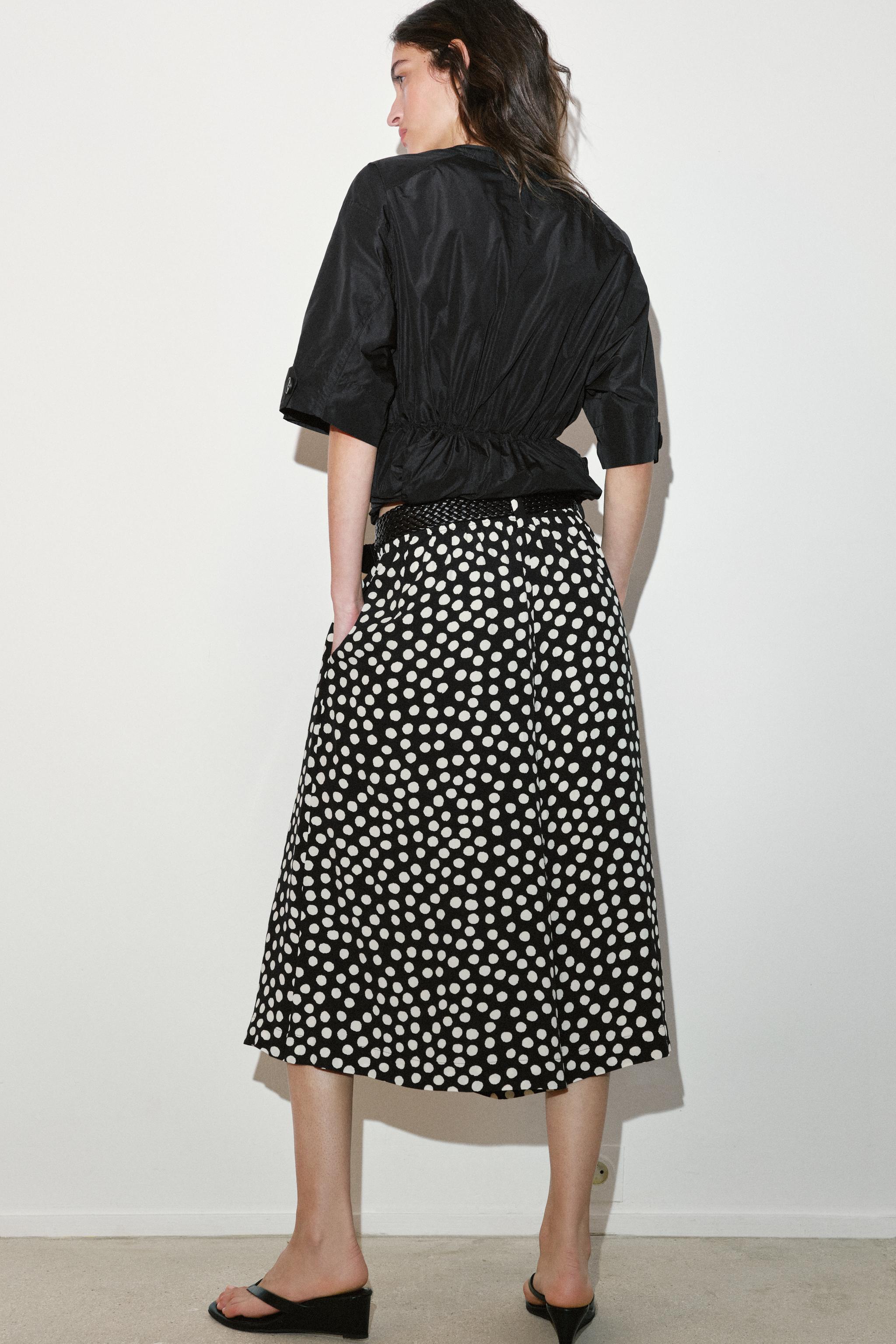 PANTALON JUPE-CULOTTE À POIS AVEC CEINTURE